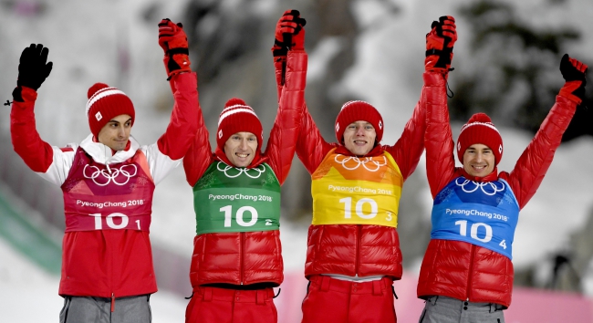 Польские прыгуны на лыжах завоевали бронзу в командном конкурсе в Пхёнчхане