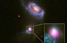 Hubble снял пожираемую черной дырой галактику